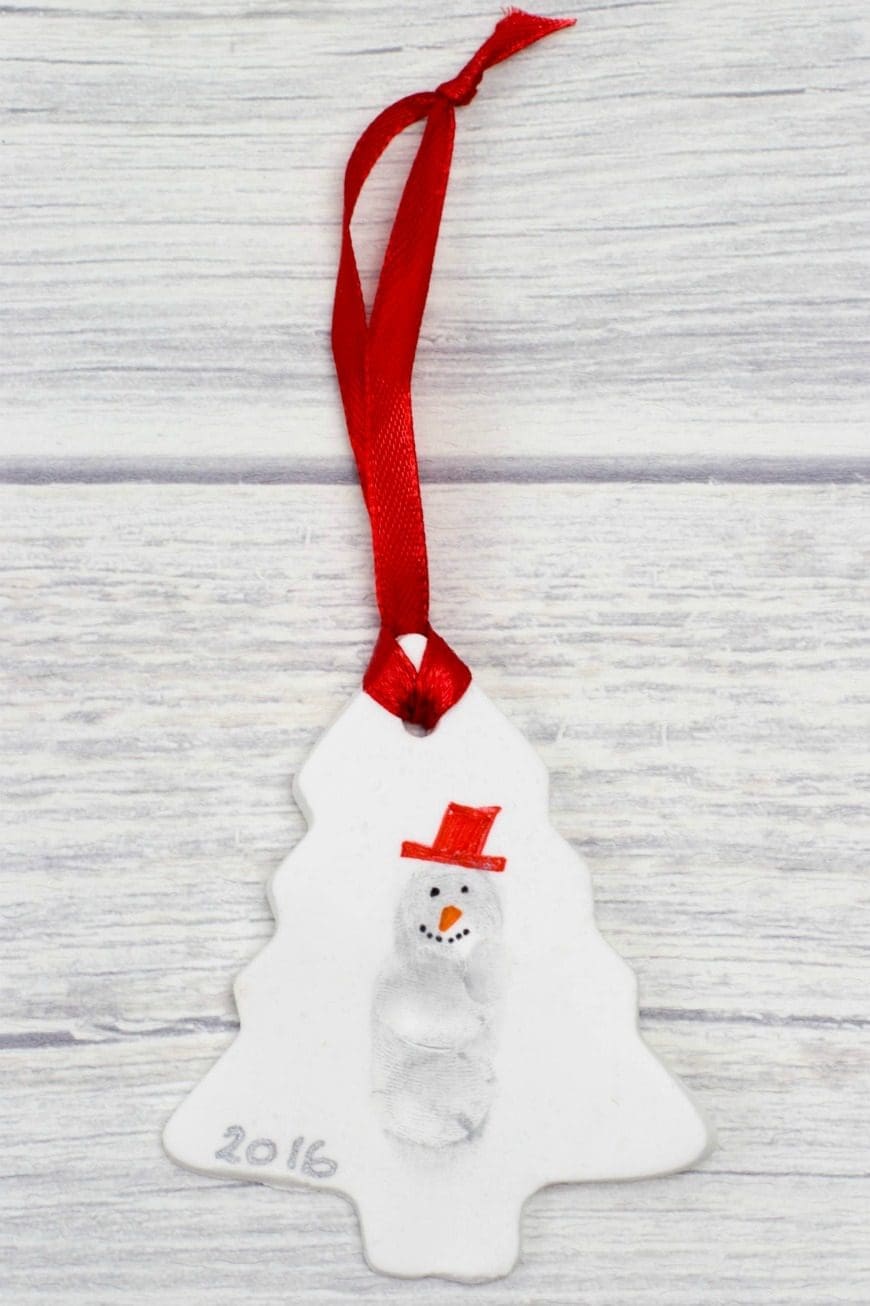 These DIY fingerprint snowmen Christmas ornaments are great for making memories and as a keepsake for your Christmas tree. A fab kids craft for Christmas