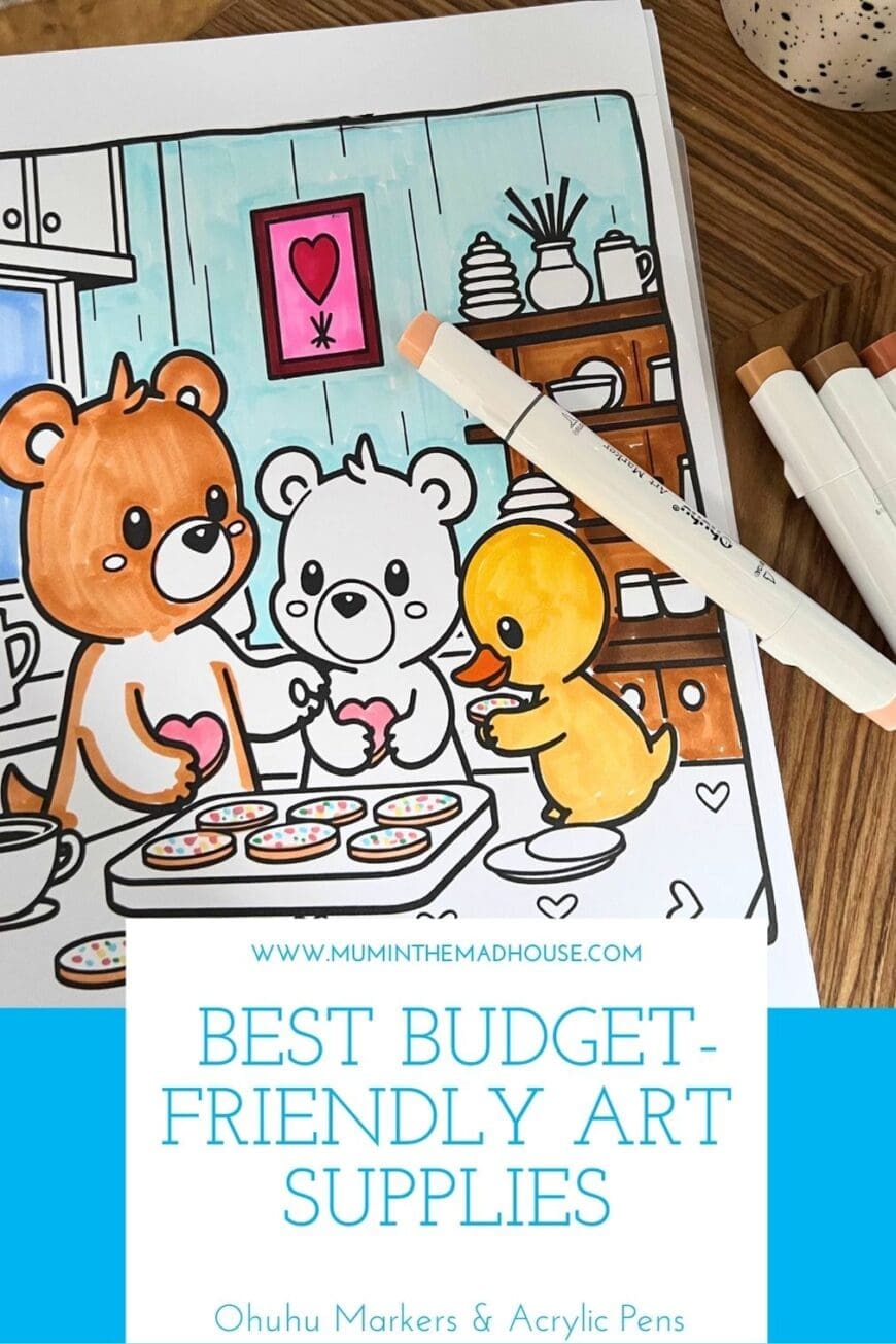 A beautifully colored illustration of a bear, a duck, and a polar bear decorating heart-shaped cookies, with Ohuhu markers placed nearby. The text overlay reads “Best Budget-Friendly Art Supplies – Ohuhu Markers & Acrylic Pens”, with a link to www.muminthemadhouse.com. The image highlights the affordability and quality of Ohuhu art supplies